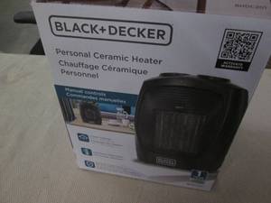 lot 598 image: Black  Decker ceramic heater...