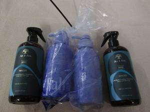 lot 711 image: 2 Bottles of shampoo (leaking) and ...