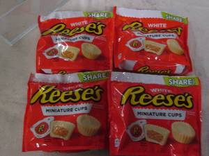 lot 716 image: 4 Bags of Reeses white chocolate mi...