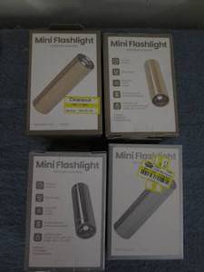 lot 839 image: 4 mini flashlights...