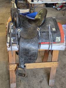lot 1A image: Beautiful N Porter Champion Rider Arizona Tooled Leather Saddle with Saddle Stand and Blanket from Approx. 1920-1930