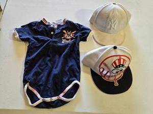lot 24 image: New Era Yankees Hats and Baby Onesie