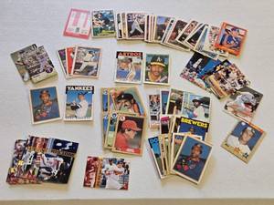 lot 30 image: Lot of Baseball Cards Featuring Various Players Including Cal Ripken, Jose Cruz, and More