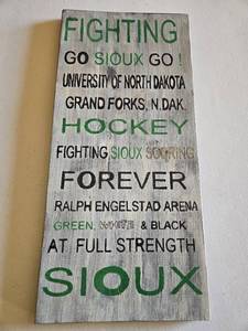 lot 41 image: University of North Dakota Fighting Sioux Wooden Hockey Sign
