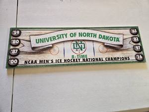 lot 42 image: University of North Dakota NCAA Mens Ice Hockey Champions Plaque