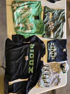 lot 44A image: University of North Dakota Apparel Lot including Adidas T-Shirt, UND Sweatshirt, and Various Shirts and Accessories