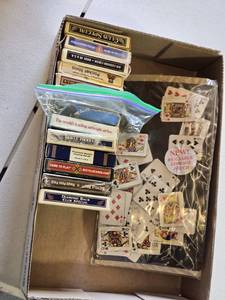 lot 46 image: Lot of Various Sports Memorabilia Items including Playing Cards, Hats, and Apparel