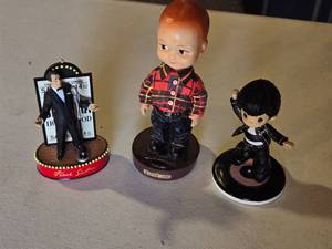 lot 67 image: Frank Sinatra, Buddy Lee, and Elvis Figurines Lot