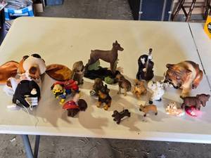 lot 69 image: Dog Figurine Collection including Plush Toy, Ceramic Dogs, and Decorative Figures
