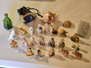 lot 71 image: Ceramic Figurine Collection with Vintage Green Glass Bottle and Shells, including Animal and Character Figurines