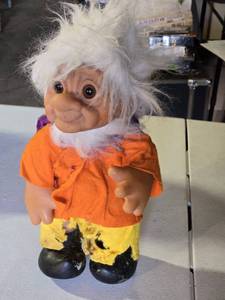lot 88 image: Troll Doll in Orange and Yellow Outfit - damaged fabric