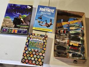 lot 93 image: Hot Wheels Cars, Fortnite Books, and Pokemon Handbook