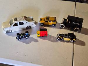 lot 94 image: Toy Vehicles including Cadillac Escalade, Hummer, and Vintage Model Cars