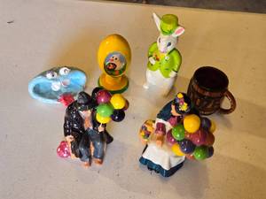 lot 102 image: Ceramic Figurines and Decorative Items including Balloon Vendor Figures, Rabbit, and Easter Egg