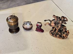 lot 105 image: Vintage Table Lighters including Woman on Horse
