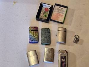 lot 105A image: Variet of Decorative Lighters, Metal Lighters and Zippo Box (box only)
