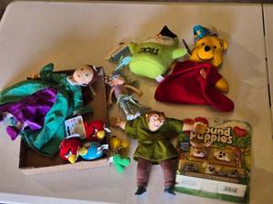 lot 115 image: Assorted plush toys and dolls including Pound Puppies, Angry Birds, and more