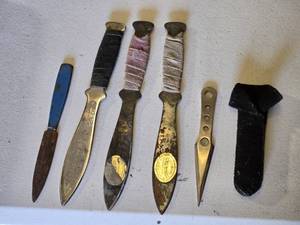 lot 140 image: Throwing Knives including Oriental Mfg Knives, Blue Handle Knife, and Sheath