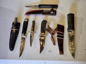 lot 142 image: Variety Vintage Knives with Sheaths, Mixed Styles and Conditions - One sheath appears to be handmade