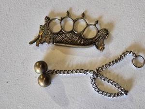 lot 145 image: Dragon Design Brass Knuckle Paperweight and Brass Balls
