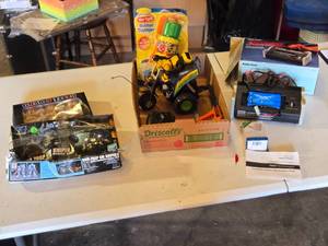 lot 160 image: Radio Shack Fast Charger, Remote Control Vehicle, and Toys