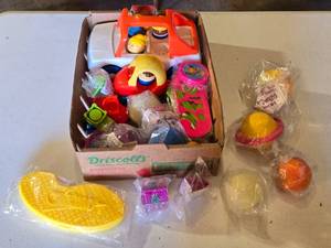 lot 162 image: Lot of Toys including The Jetsons Puzzle Ornaments, Fisher Price Vehicle, and Assorted Toy Figures