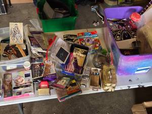 lot 200 image: Assorted Craft Supplies including Fashion Angels Charm Bracelet Kit, Crafters Square Apron, and Adult Coloring Books