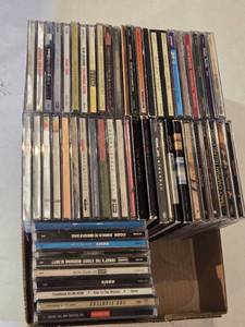 lot 210 image: Box of Various Music CDs including Pearl Jam, Oasis, Tracy Chapman, Foo Fighters, STing, Springsteen,  Eric Clapton and More