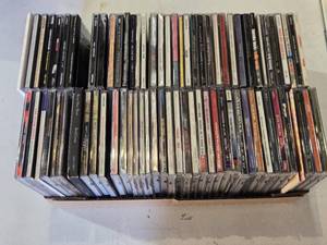 lot 213 image: Lot of Music CDs including Beastie Boys, Smashing Pumpkins, Seal, and The Stone Roses and More