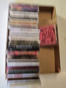 lot 216 image: Ernie Ball Super Slinky Guitar Strings and Music CD Collection featuring artists like Kenny G, Andrea Bocelli, and Santana.