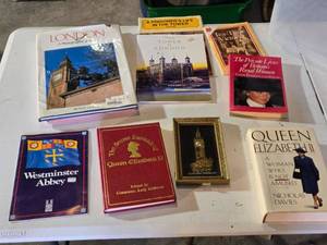 lot 244 image: Books about British royalty and landmarks including London A Photographic Journey by Benny Green, The Tower of London, and Queen Elizabeth II A Woman Who Is Not Amused by Nicholas Davies