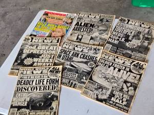 lot 402 image: Weekly World News and National Enquirer Tabloids Early 2000s