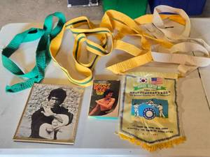 lot 410 image: Martial Arts Belts, Bruce Lee Book and Karate Center Banner
