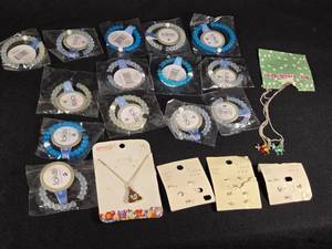 lot 320 image: Lokai Bracelets, Emoji Necklace, Sterling Silver Earrings, and Unicorn Necklaces