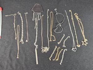 lot 322 image: Assorted Costume Jewelry Lot including Necklaces, Bracelets, and Pendants