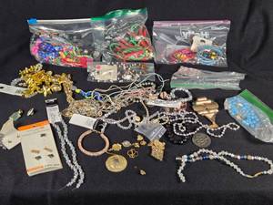 lot 323 image: Lot of Jewelry and Craft Supplies including Beads, Bracelets, and Earrings