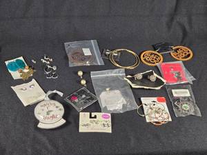 lot 328 image: Assorted Jewelry Items including Earrings, Bracelets, and Accessories Lot