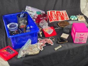 lot 356 image: Assorted Household and Decorative Items including Coca-Cola Labels, Crystal Heart Trinket, and Butterfly Hair Clips
