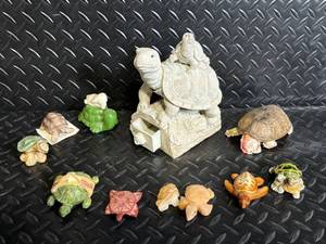 lot 76 image: Turtle Figurines - Centerpiece Two-Turtle Sculpture with Assorted Miniatures
