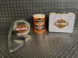 lot 1 image: Harley-Davidson Diamond Plate Lunch Box Set with Biker Brew Coffee Can & Round Tin