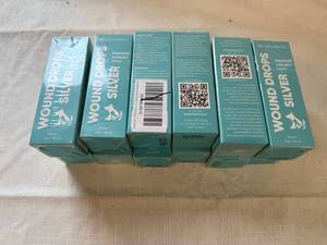 lot 33 image: 12x Silver Wound Drops