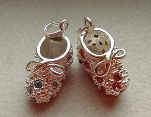 lot 62 image: 925 Baby Boots Charms