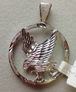 lot 102 image: Eagle Pendant Marked Sterling