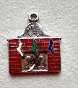 lot 177 image: Sterling Painted Fireplace Charm