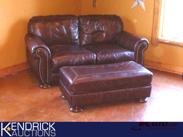 lot 32 image: Ashley Leather Sofa and Ottoman