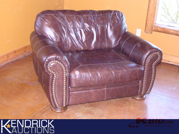 lot 33 image: Ashley Leather Sofa Chair