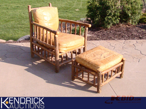 lot 35 image: Log Leather Chair and Ottoman