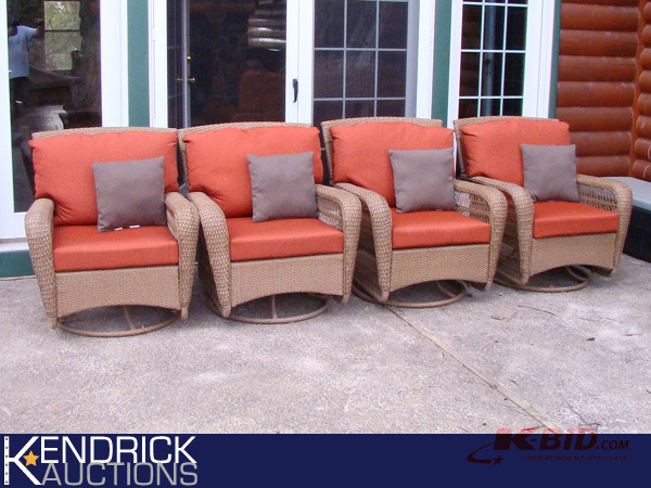lot 47 image: 4 Mint condition Martha Living Wicker Outdoor Swivel Glide Rockers