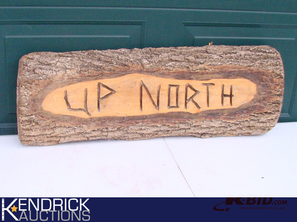 lot 76 image: Carved Log Up North Sign