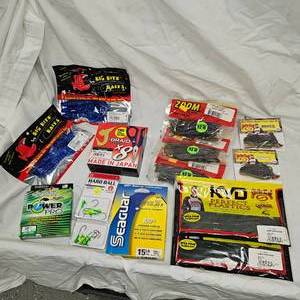 lot 24 image: Lot of New Tackle, Strike King, Seagaur, Big Bite, Zoom, Mission, VMC